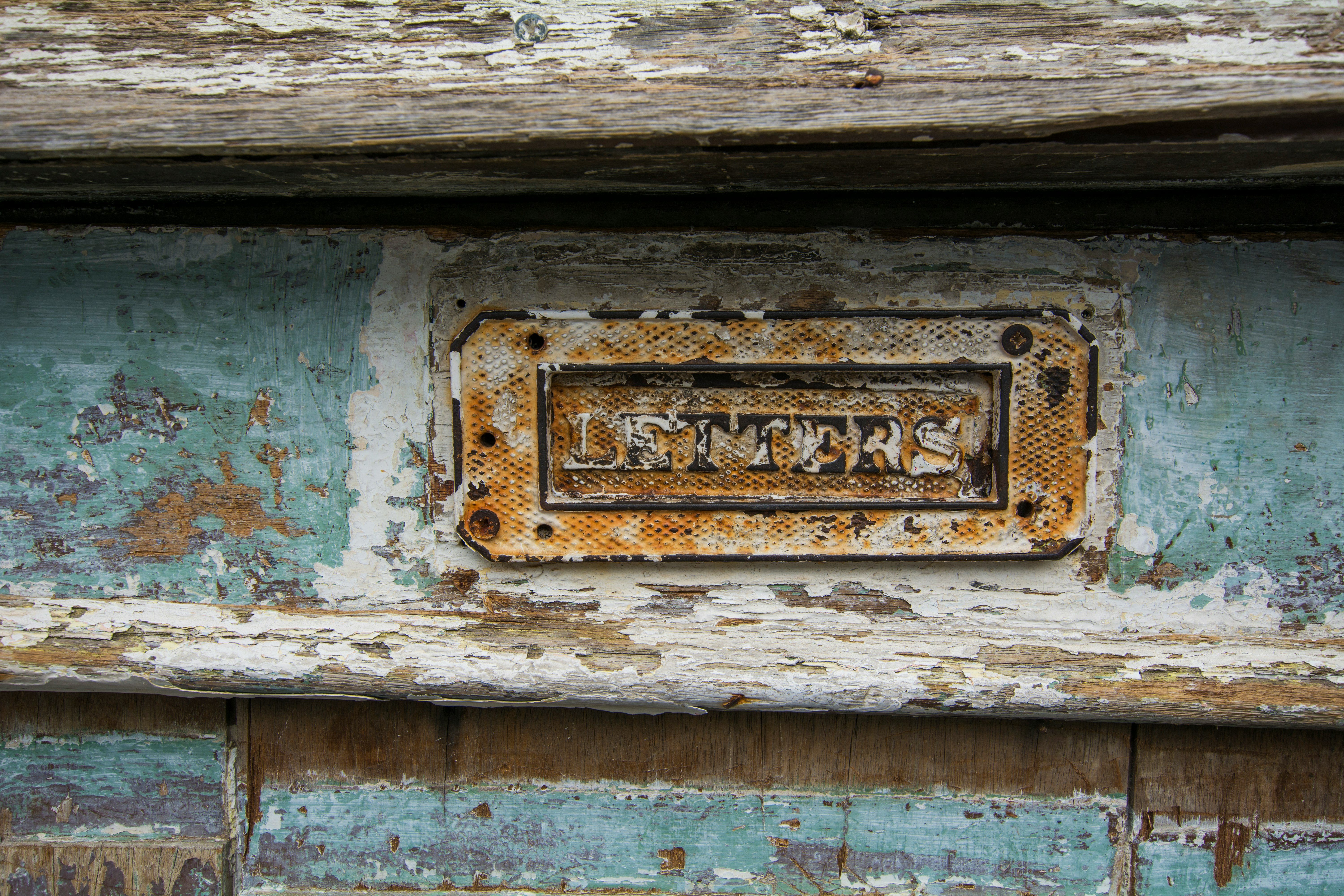 letters signage inside wooden panel